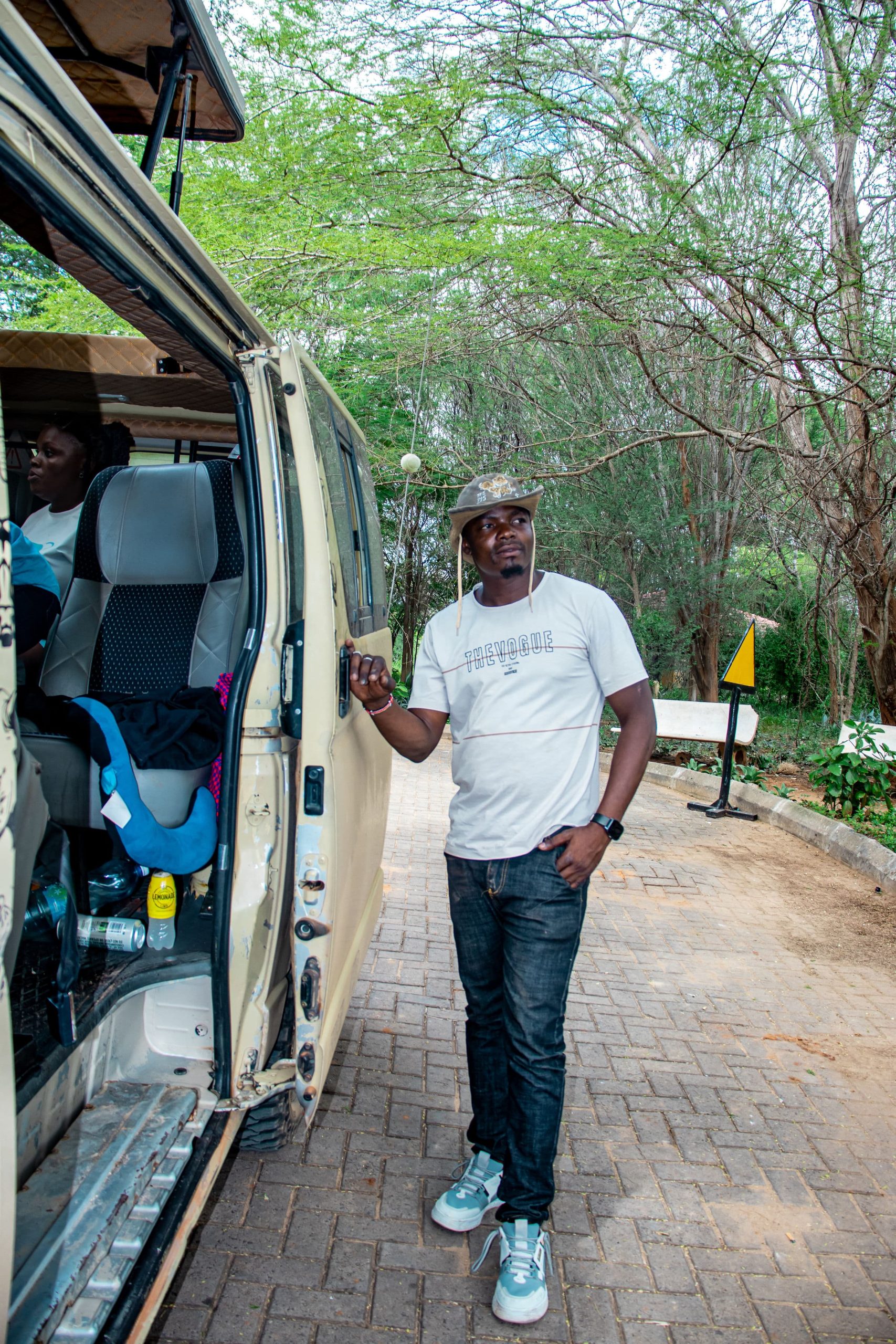 Safari vehicle in Tsavo National Park at golden hour — Steve and Richard Safaris Kenya